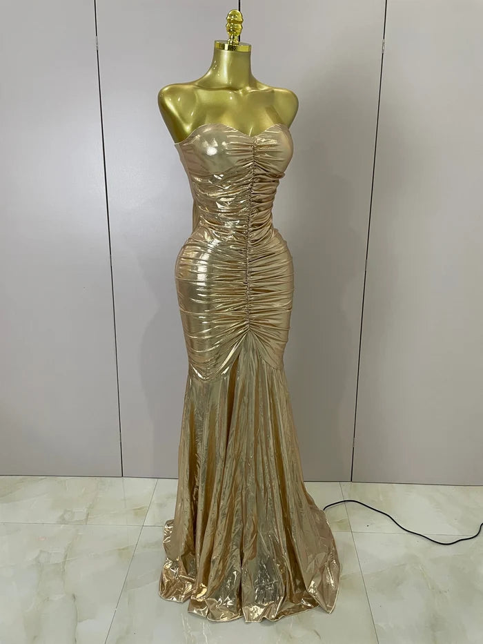 Alana gold strapless ruched backless maxi gown for women. Elegant dress for weddings, prom, birthdays, and evening parties.