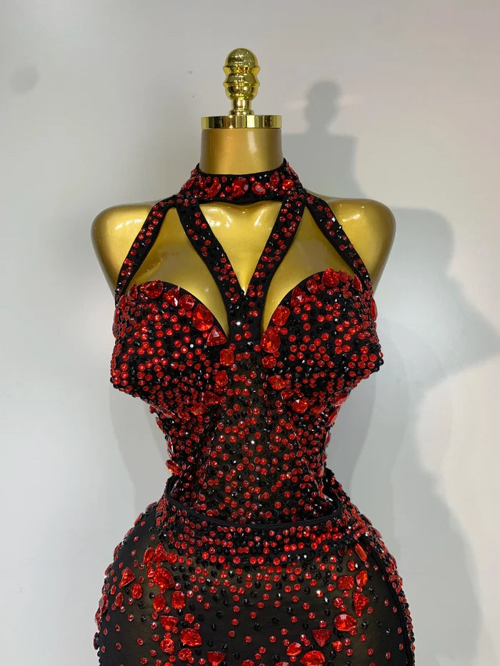 Turn heads in the Amanda backless red rhinestone black mesh jumpsuit. Sparkly bodycon outfit for stage performances, parties, and birthdays.