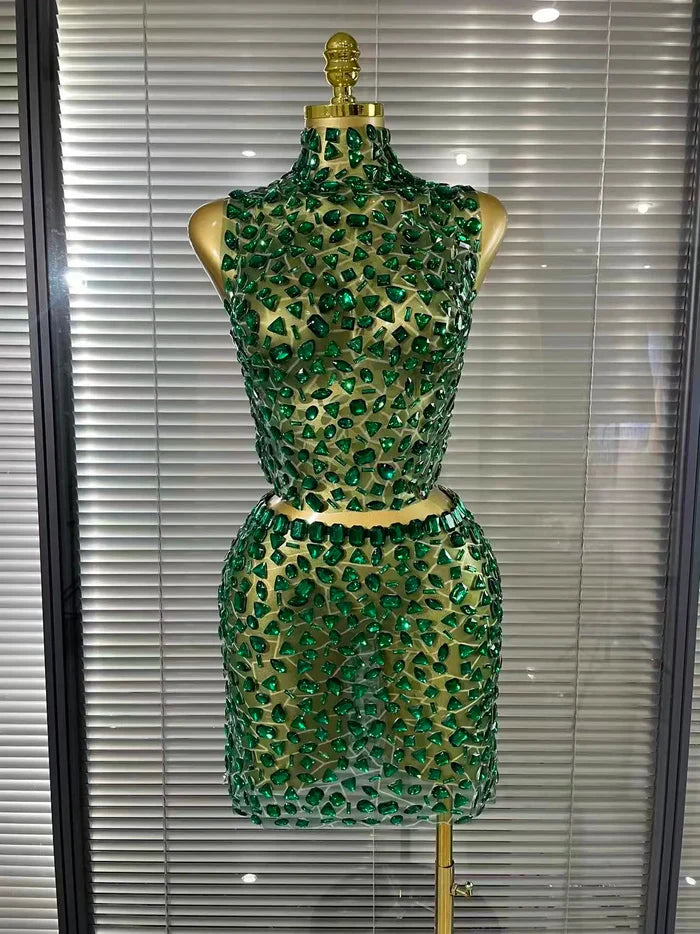 Amber crystal mesh two piece bodycon mini dress set for women. Sexy outfit for nightlife, stage wear, and party events.