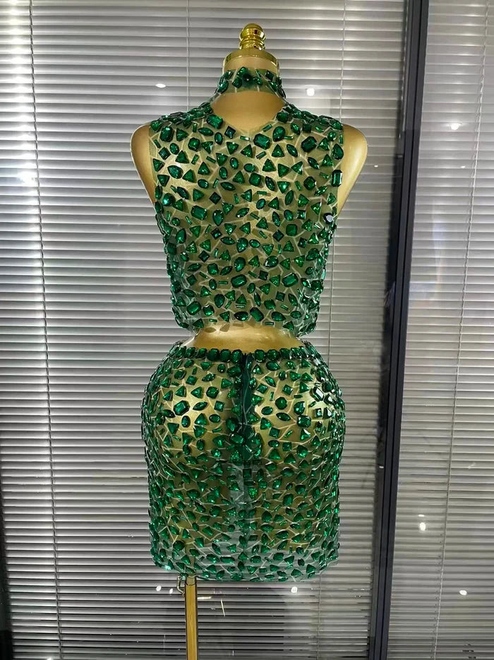 Amber crystal mesh two piece bodycon mini dress set for women. Sexy outfit for nightlife, stage wear, and party events.
