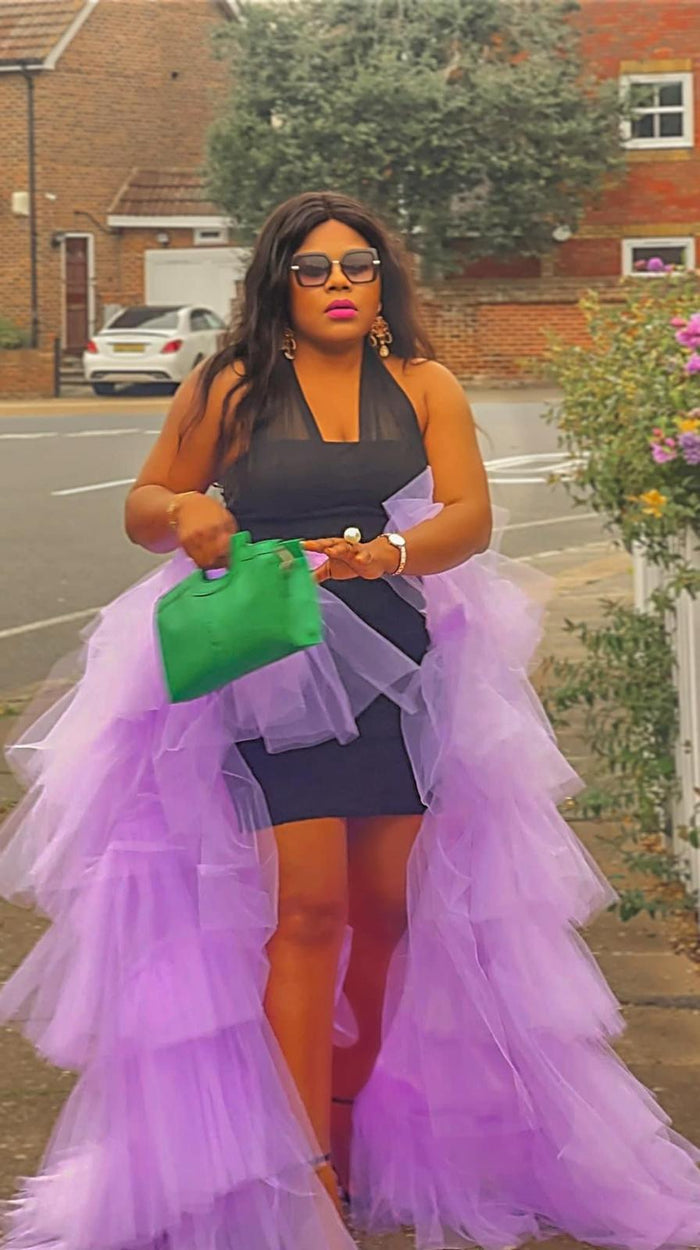 Amethyst purple detachable tiered tulle overlay skirt styled over mini dress for dramatic statement look