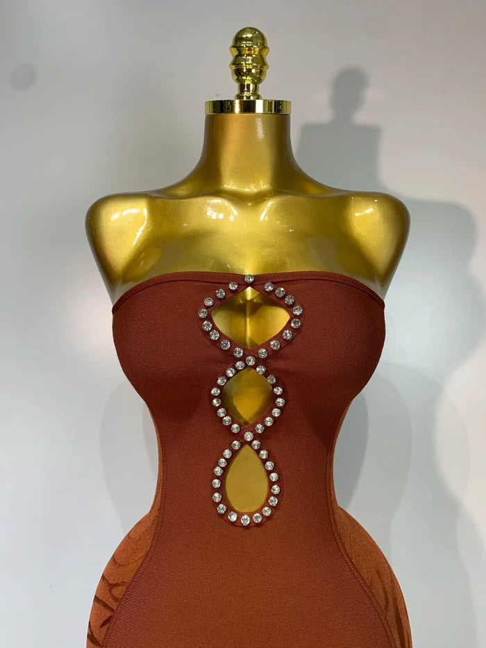 Angela strapless rhinestone cut out bandage dress for women. Sexy luxury bodycon outfit for birthdays, prom, parties, and evening events.