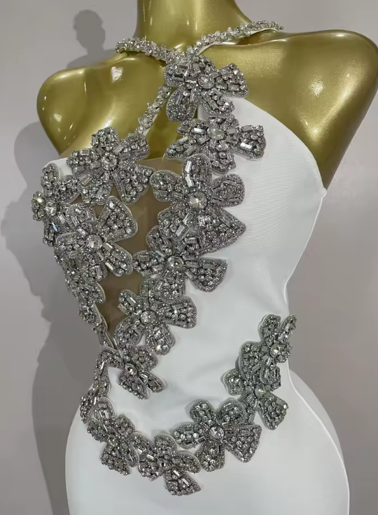 Bianca white backless bandage mini dress featuring a bodycon fit and hand-applied sparkly crystal diamonds.