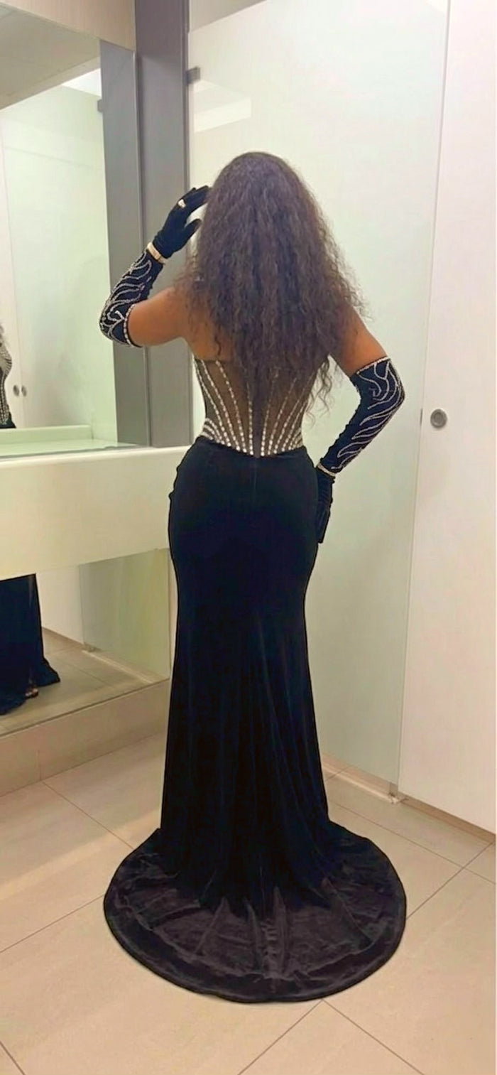 Back view of black velvet evening gown with beaded corset bodice and train luxury formal dress