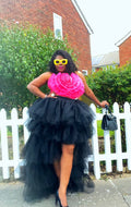 Black high-low tiered tulle skirt with voluminous layered design and dramatic silhouette