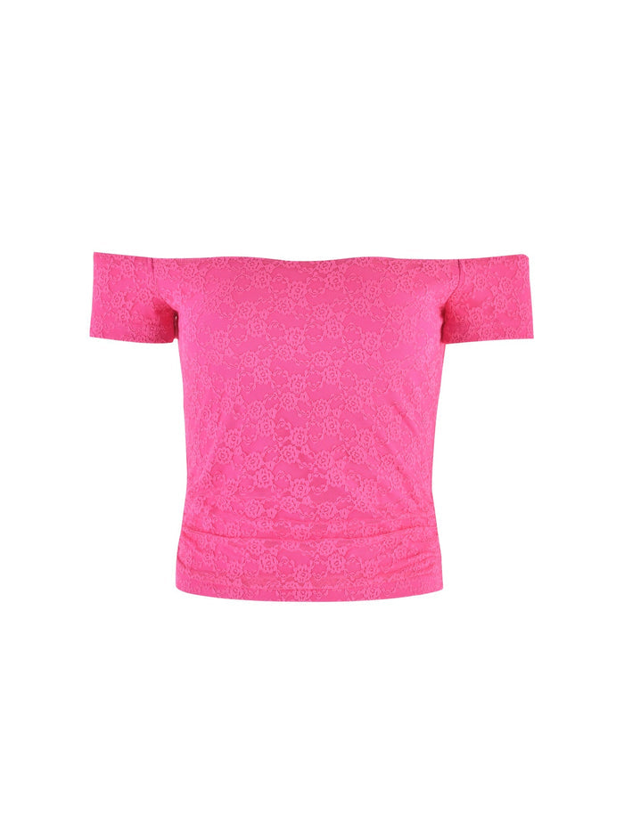 The CAIDEN TOP in hot pink by TIGERMIST is a vibrant off-the-shoulder women's top with short sleeves, featuring a subtle floral lace pattern that gives it a textured appearance. The garment is presented against a plain white background.