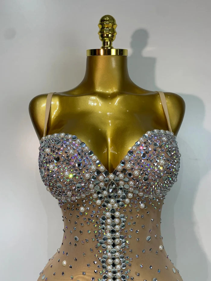 Candice rhinestone pearl mesh bodycon bodysuit for women. Luxury sparkly outfit for birthdays, stage wear, and nightlife events.