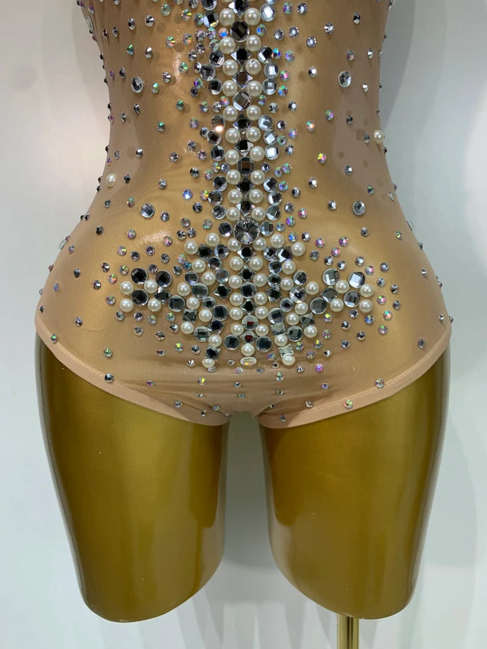 Candice rhinestone pearl mesh bodycon bodysuit for women. Luxury sparkly outfit for birthdays, stage wear, and nightlife events.