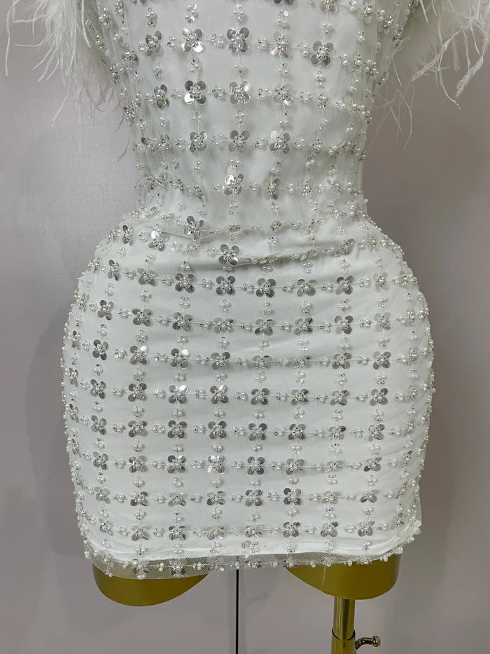 Carmina white feather sequin strapless bodycon mini dress. Perfect for birthdays, bridal parties, cocktails, and special events.