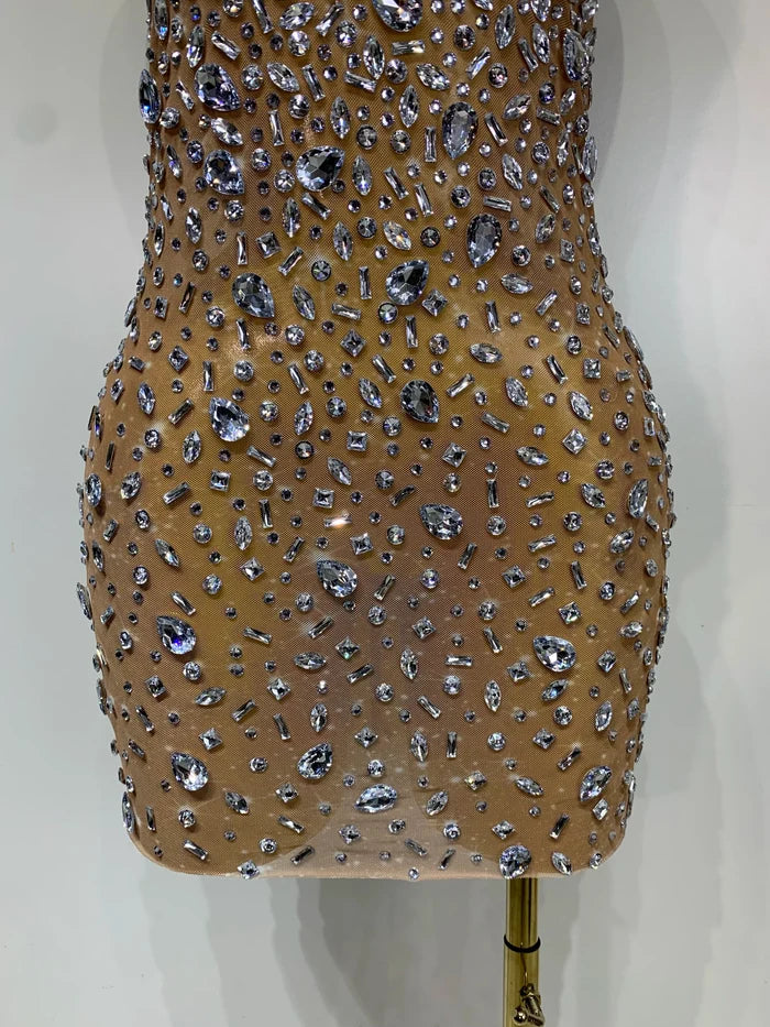 Cassandra sleeveless rhinestone bodycon mini dress for women. Sexy sparkly outfit for birthdays, nightlife, and stage wear.