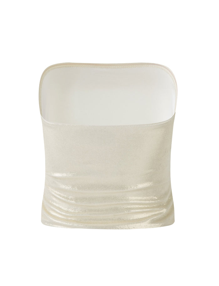 The COSIMA TOP - GOLD from TIGERMIST is a beige, strapless tube top with a slight shimmer. The fabric appears smooth and stretchy, featuring a simple and minimalist design. Laid flat, the top showcases its shape and texture beautifully.