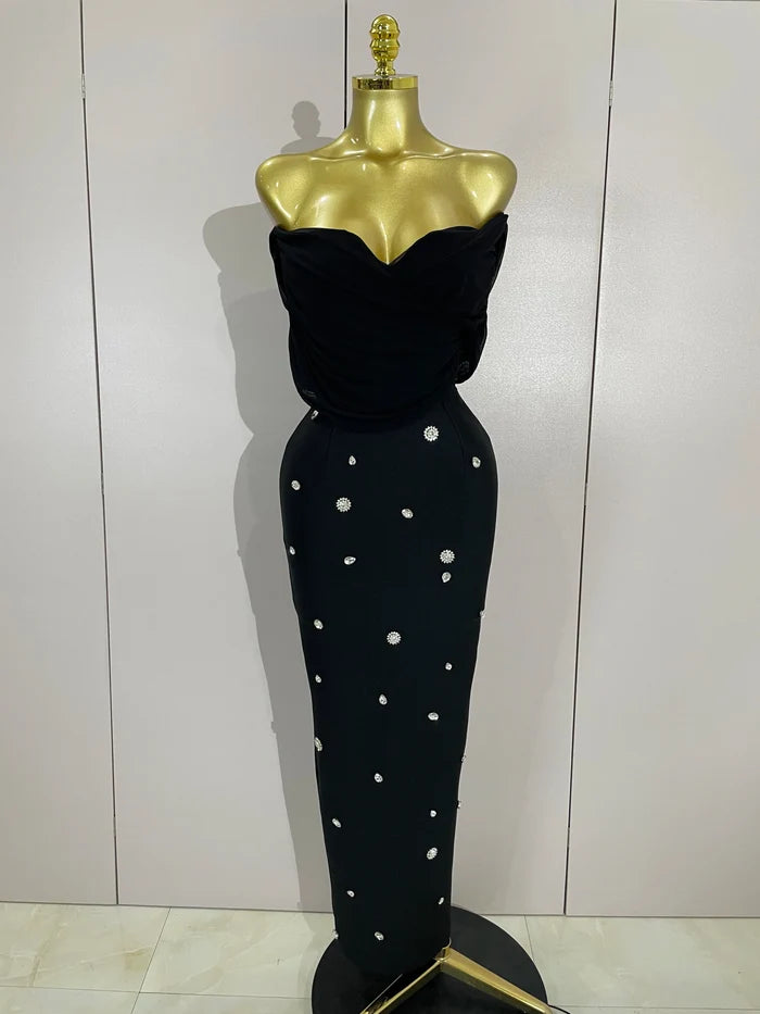 Crissy Crystal sexy off-the-shoulder bodycon bandage long dress with sparkling rhinestone details.