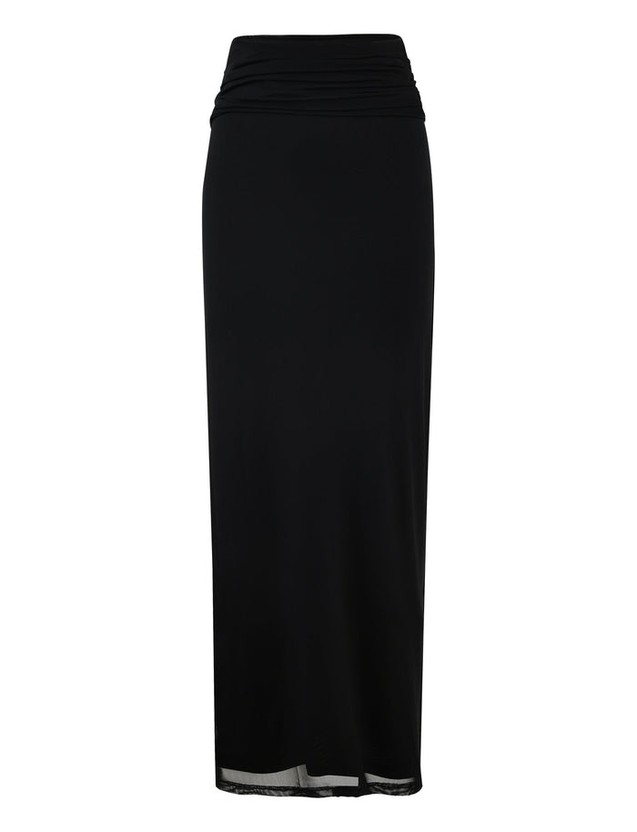 The CYNTHIA MAXI SKIRT - BLACK from TIGERMIST is a long, high-waisted black skirt featuring a slightly gathered waist. Its smooth fabric and straight-cut design fall just above the ankles, offering a simple and elegant style perfect for both casual and formal occasions.