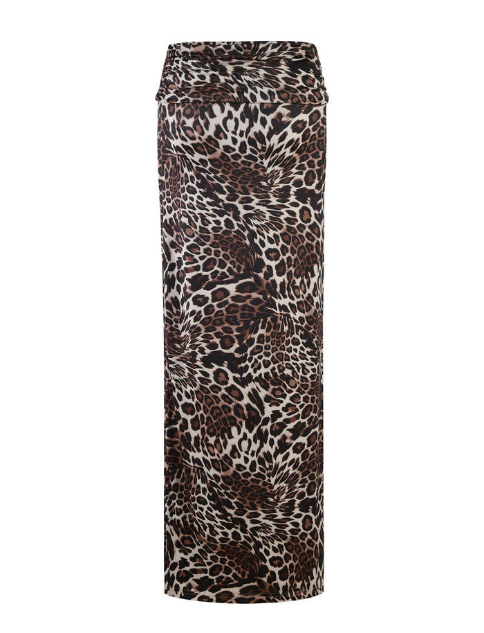 The Cynthia Maxi Skirt - Multi : Leopard from TigerMist is a long, floor-length pencil skirt featuring a bold leopard print pattern. This form-fitting, high-waisted design showcases various shades of brown, black, and white in the animal print.