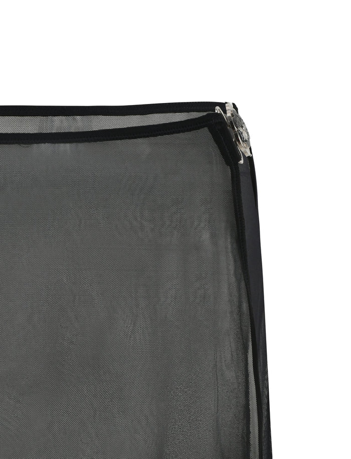 A close-up photo of the CYNTHIA MINI MESH SKIRT - BLACK from TIGERMIST, featuring visible seams and a zipper on the right side. The lightweight, slightly sheer black mesh fabric highlights an even, fine texture characteristic of Tiger Mist designs.