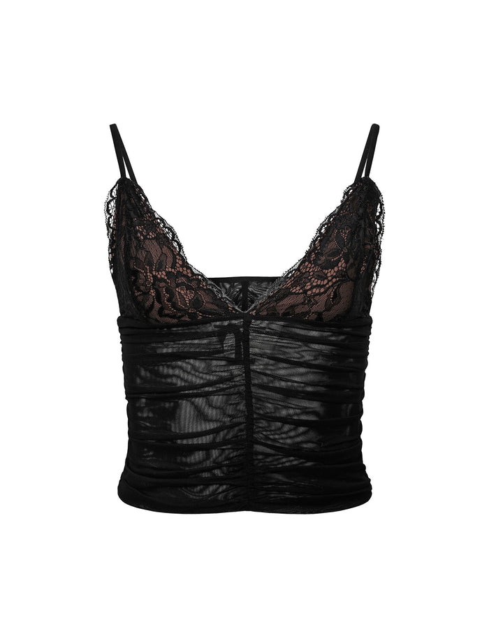 The DEENA TOP - BLACK from TIGERMIST is a black, sheer lace camisole featuring thin spaghetti straps. The top section showcases intricate lace detailing with a floral pattern, and the midsection is ruched, providing a fitted and textured look.