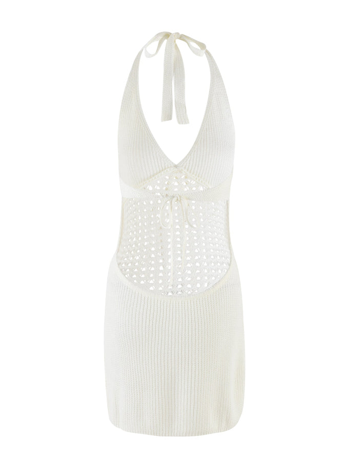The DELTA MINI DRESS in white by TIGERMIST features a halter neckline, open back, sleeveless mini silhouette, tie accents at the neck and waist, and a textured knit design on the bodice and skirt.