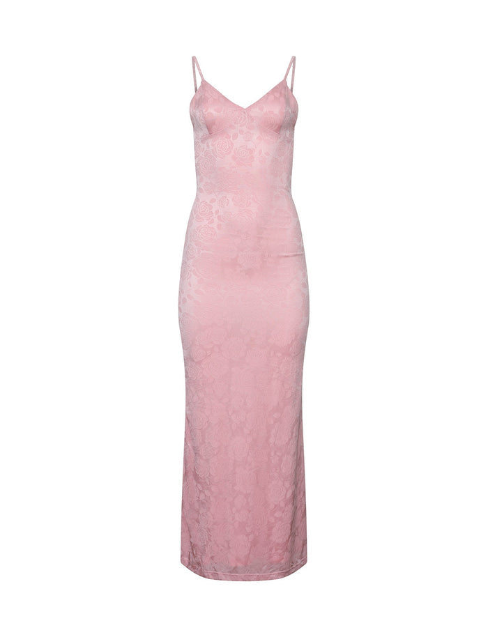 The ERICKA DRESS - PINK by TIGERMIST is a sleeveless satin dress with spaghetti straps and a long, form-fitting silhouette. This elegant design features a subtle floral pattern woven into the fabric, enhancing its sophisticated appeal.