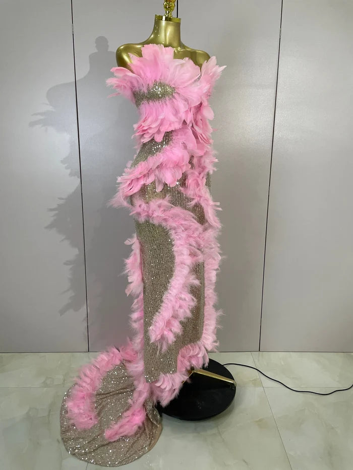 Faye pink sequin feather mesh mermaid gown for women. Glamorous dress for birthdays, prom, nightclub, and evening events.