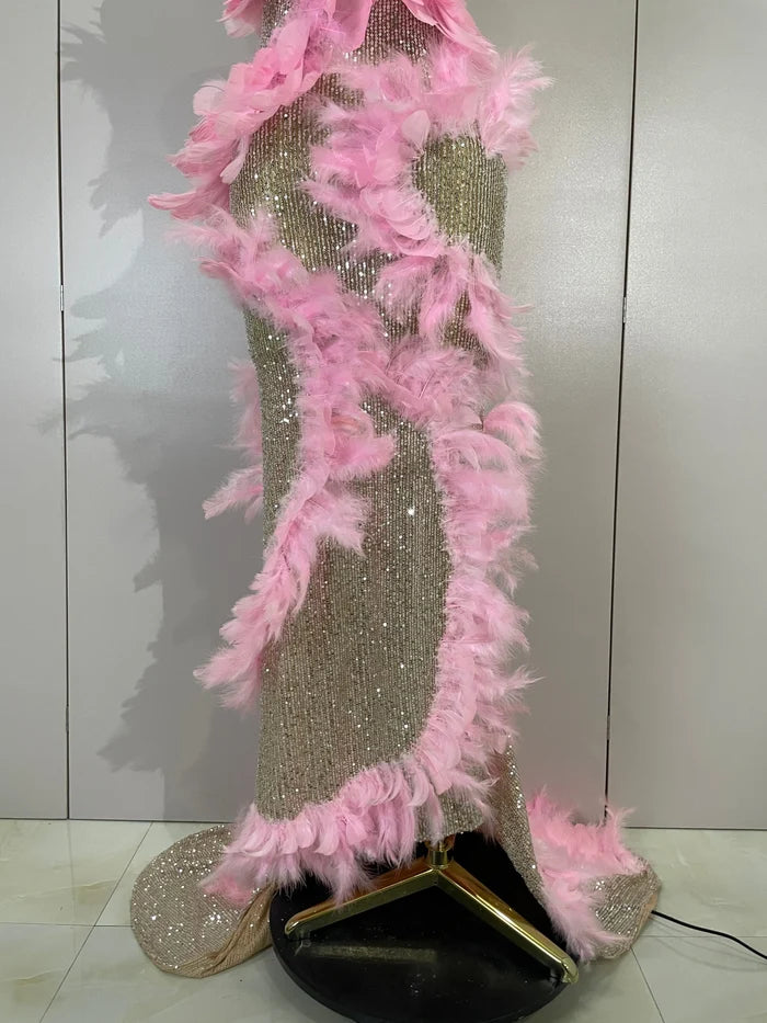Faye pink sequin feather mesh mermaid gown for women. Glamorous dress for birthdays, prom, nightclub, and evening events.