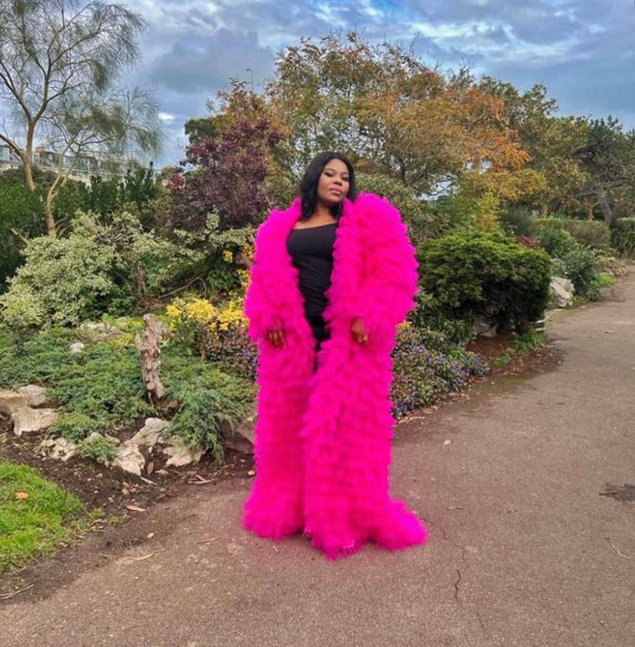 Asymmetric ruffled tiered tulle statement coat with train for elaborate weddings