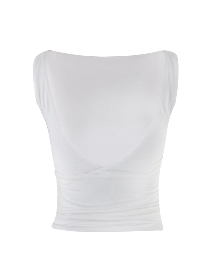 The GWYN TOP - WHITE by TIGERMIST is a stunning women's sleeveless top, featuring a deep V-neck and ruched detailing at the sides. The fabric is fitted and stretchy, designed to hug the body perfectly. The plain white background highlights the simplicity and elegance of this stylish piece.