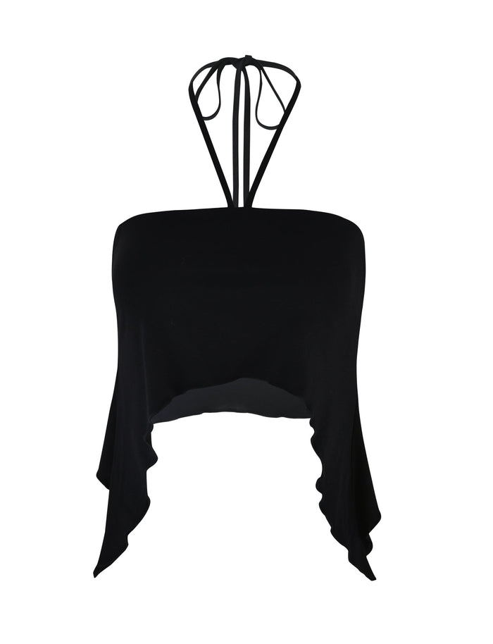 The INDIA TOP - BLACK from TIGERMIST is a halter top with a strap that ties at the neck. It features an asymmetrical hem with longer draped sides, giving it a flowing appearance. The fabric is solid black and looks lightweight.