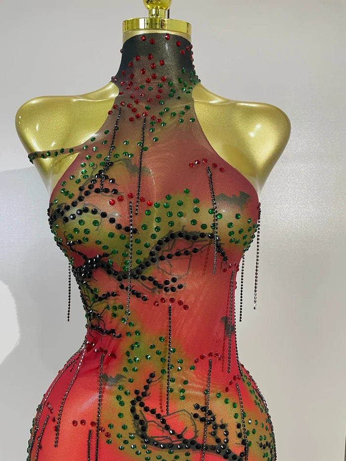 Sparkle in the Jaila rhinestone mesh asymmetric bodycon mini dress. Sexy party dress for birthdays, clubs, cocktail parties, and special events.