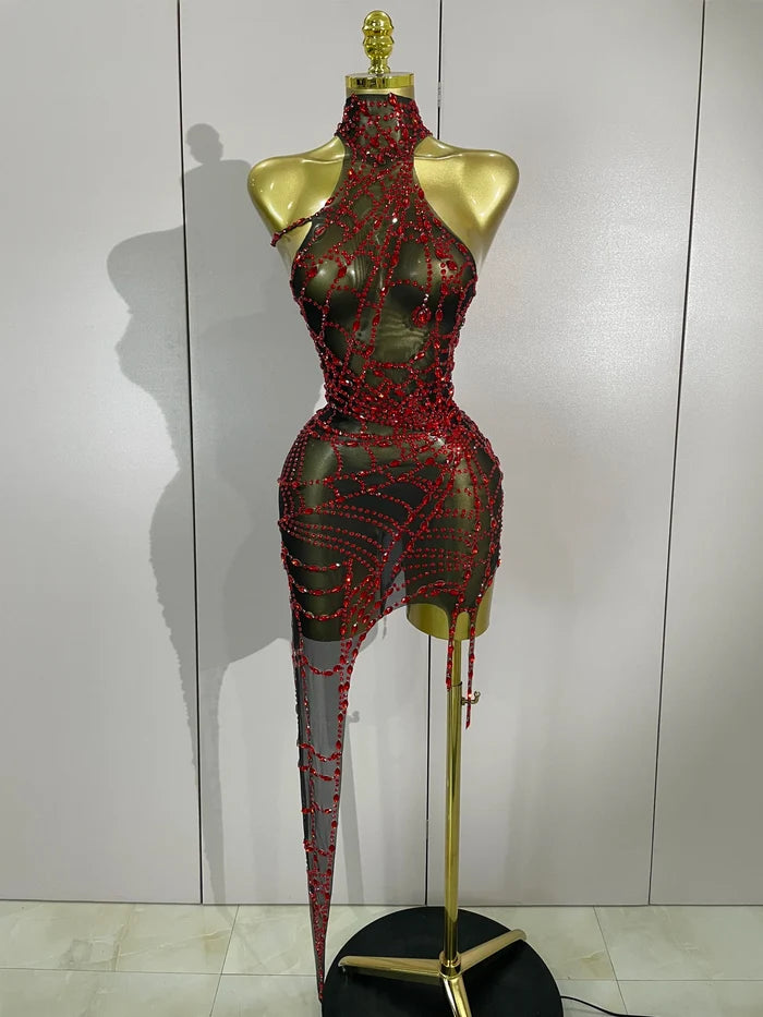 Sparkle in the Jaila rhinestone mesh asymmetric bodycon mini dress. Sexy party dress for birthdays, clubs, cocktail parties, and special events.