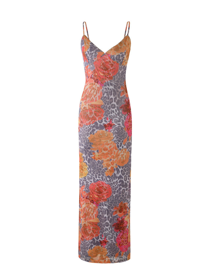 Introducing the JULIANNA DRESS - MULTI : LEOPARD : ORANGE LEOPARD by TIGERMIST. This sleeveless, spaghetti strap dress showcases a dynamic pattern featuring a blend of orange, red, and pink floral prints interspersed with gray leopard spots running the length of the dress. The lightweight fabric is designed to fit closely, creating a sleek and elegant silhouette.