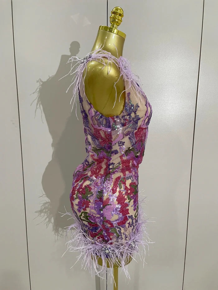 Celebrate in style with the Karina rhinestone feather embroidered bodycon dress. Elegant party dress for birthdays, cocktails, and special events.