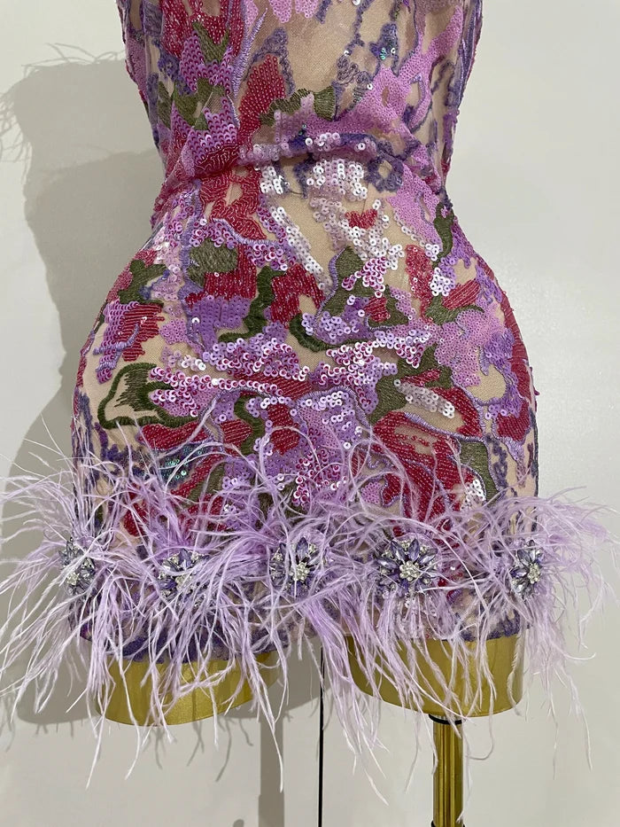 Celebrate in style with the Karina rhinestone feather embroidered bodycon dress. Elegant party dress for birthdays, cocktails, and special events.