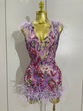 Celebrate in style with the Karina rhinestone feather embroidered bodycon dress. Elegant party dress for birthdays, cocktails, and special events.