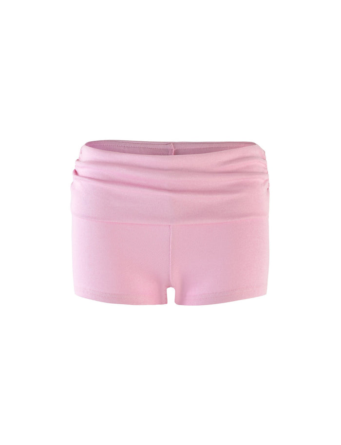 Introducing the KARINA SHORT - PINK : BLUSH by TIGERMIST, these light pink shorts feature a high-waisted, ruched waistband and a smooth finish. They offer a snug fit, making them ideal for both casual wear and activewear. The design is simple and solid-colored with no visible logos or patterns.