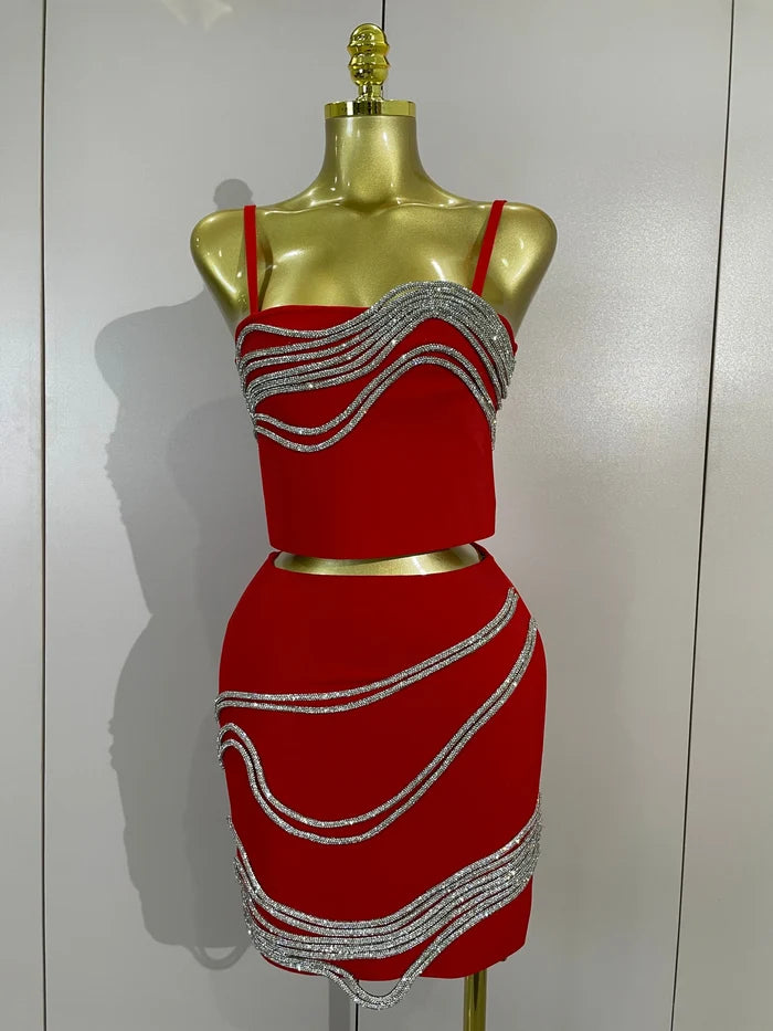 Shine in the Kristi diamond chain two-piece bandage mini dress set. Sexy bodycon outfit for parties, birthdays, clubs, and special events.