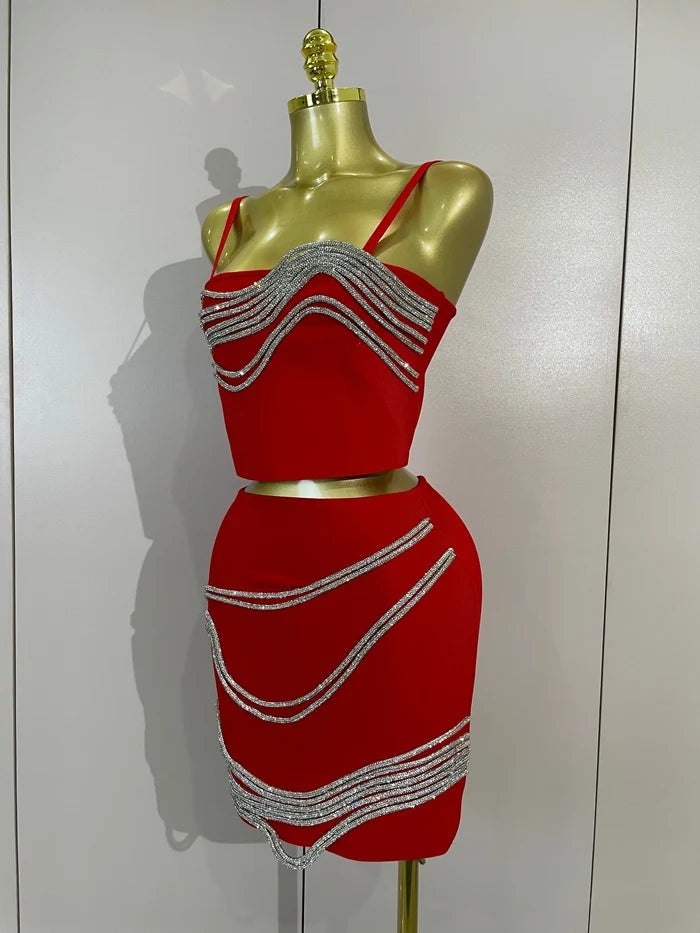 Shine in the Kristi diamond chain two-piece bandage mini dress set. Sexy bodycon outfit for parties, birthdays, clubs, and special events.