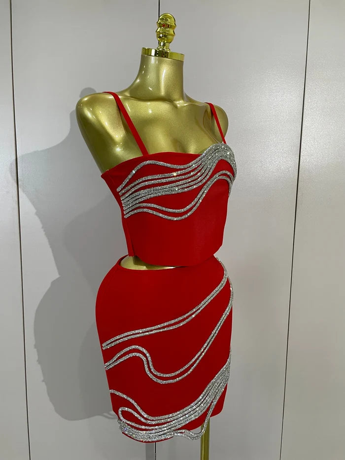 Shine in the Kristi diamond chain two-piece bandage mini dress set. Sexy bodycon outfit for parties, birthdays, clubs, and special events.