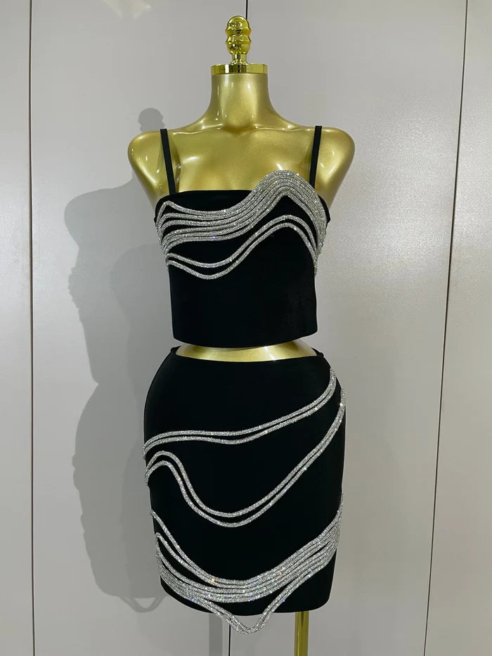 Shine in the Kristi diamond chain two-piece bandage mini dress set. Sexy bodycon outfit for parties, birthdays, clubs, and special events.