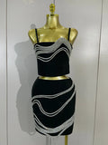 Shine in the Kristi diamond chain two-piece bandage mini dress set. Sexy bodycon outfit for parties, birthdays, clubs, and special events.