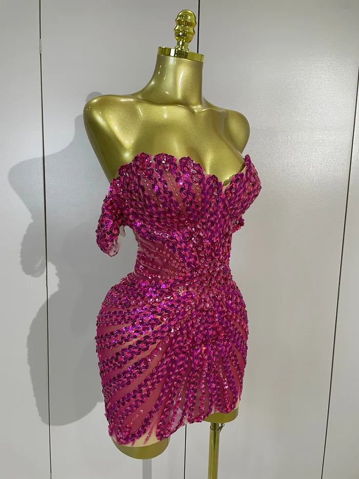Turn heads in the Kyle rhinestone sequin off-the-shoulder mesh mini dress. Elegant party dress for birthdays, cocktail parties, and special events.