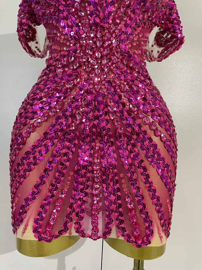 Turn heads in the Kyle rhinestone sequin off-the-shoulder mesh mini dress. Elegant party dress for birthdays, cocktail parties, and special events.