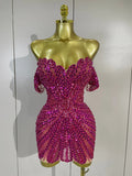 Turn heads in the Kyle rhinestone sequin off-the-shoulder mesh mini dress. Elegant party dress for birthdays, cocktail parties, and special events.