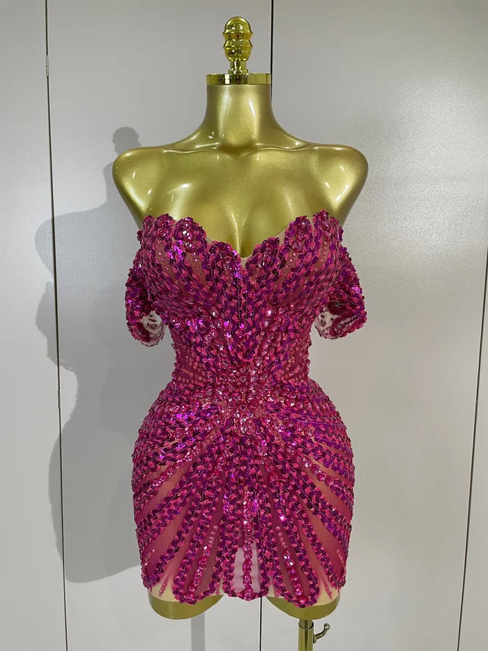 Turn heads in the Kyle rhinestone sequin off-the-shoulder mesh mini dress. Elegant party dress for birthdays, cocktail parties, and special events.