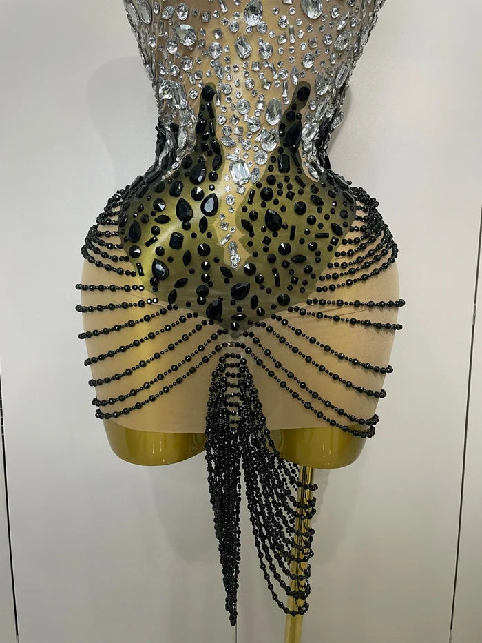 Laine crystal beaded mesh backless mini dress for women. Sexy sparkly outfit for birthdays, prom, and evening parties.