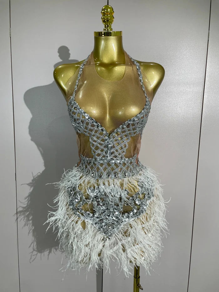 Shine in the Lasha luxury rhinestone feather mesh patchwork mini dress. Elegant party dress for birthdays, cocktails, and special occasions.