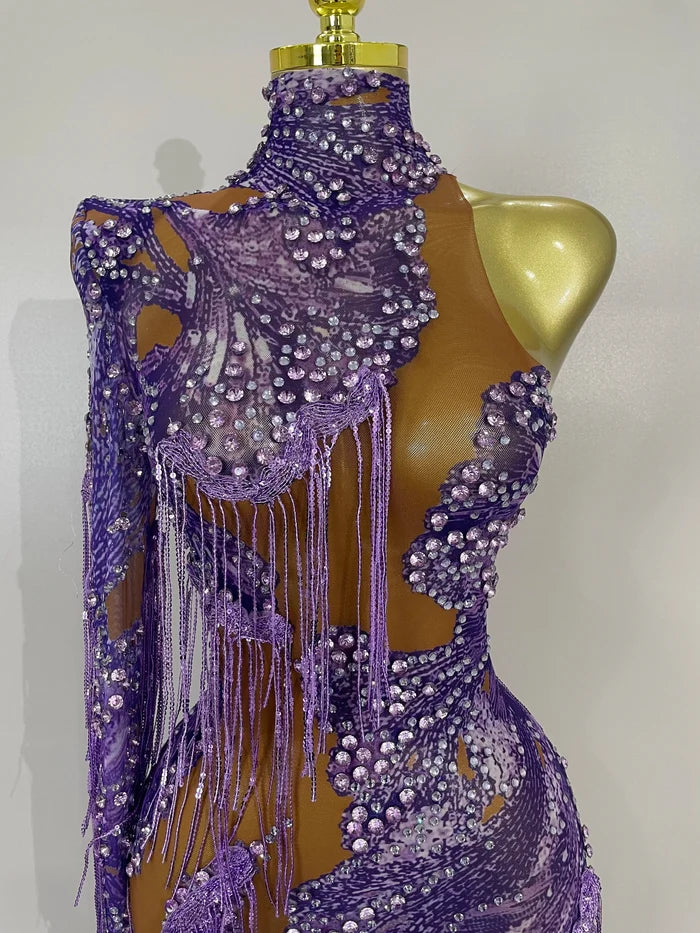 Leonna purple diamond tassel one shoulder mesh jumpsuit for women. Sparkly outfit for festivals, birthdays, nightlife, and stage wear.
