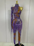 Leonna purple diamond tassel one shoulder mesh jumpsuit for women. Sparkly outfit for festivals, birthdays, nightlife, and stage wear.