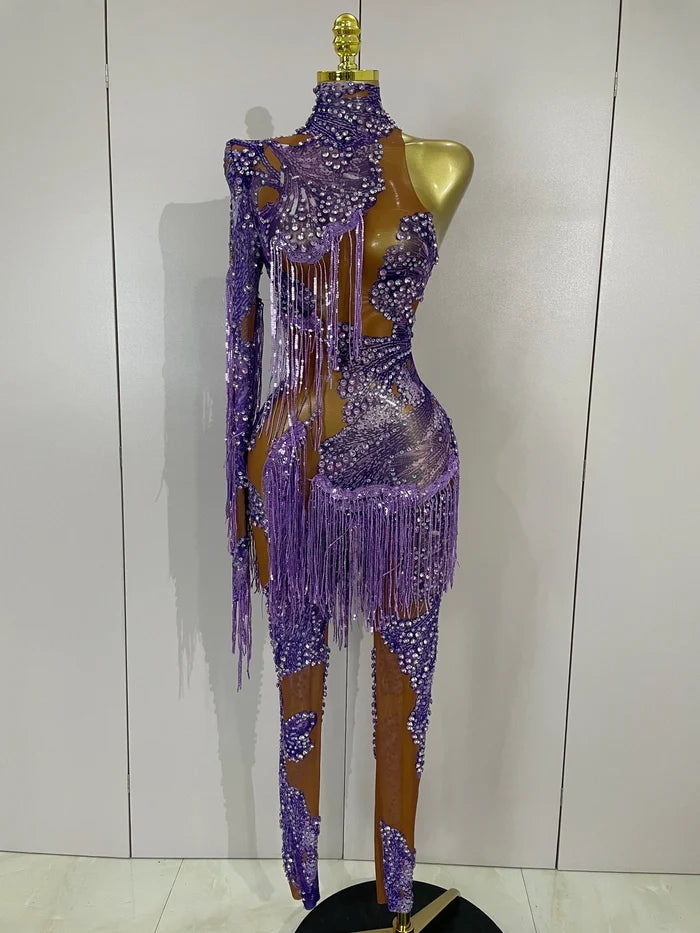 Leonna purple diamond tassel one shoulder mesh jumpsuit for women. Sparkly outfit for festivals, birthdays, nightlife, and stage wear.