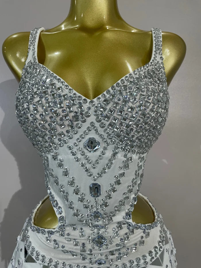 Madelle silver rhinestone tassel bodysuit dress for women. Sexy performance outfit for nightlife, stage wear, and parties.