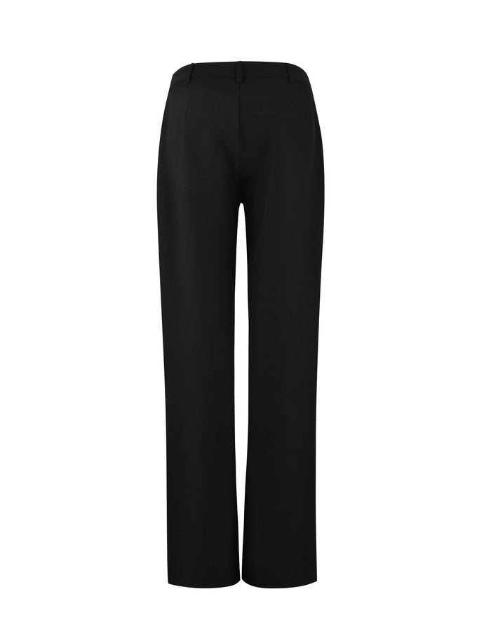 A rear view of the MARJORIE PANT - BLACK by TIGERMIST, a pair of black, full-length dress pants with a straight cut. These pants feature a waistband with belt loops and two back welt pockets, offering a smooth, tailored appearance perfect for formal or business attire.